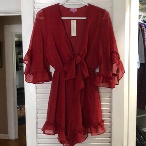 NWT Francesca’s red romper size XS. Perfect for summer or warm weather!